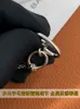 Luxuriöse Kupfer-Nasenkette mit langem Schweinenase-Anhänger für Frauen, lichtecht, leicht, luxuriös, einzigartig und hochwertig, 2024 neue Schnalle aus Silber mit Logo