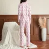 Vêtements à la maison Femmes Pyjama printanier Print coeur Impression de bouton à manches longues Clôture de bouton avec pantalon Loose Sleepwear Loungewear