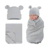 Couvertures née en mousseline enveloppe avec un chapeau bébé recevant une couverture de couverture de couchage solide