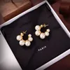 Modemärken örhängen örn studs högkvalitativa designers örhänge klassiska gyllene pärlsmycken för kvinnliga bröllopspresent parti