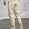 Pantaloni da uomo con coulisse in vita Sport da uomo che corrono Sport dalla vestibilità ampia con tasche laterali alla caviglia per la palestra