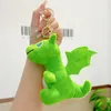 Llavero creativo de dinosaurio de peluche, muñeca bonita, colgante de muñeca, juguete de máquina de agarre, bolsa de libros, decoración colgante, pequeño regalo al por mayor