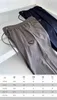 Calças masculinas designer alta versão primavera e outono nova p casa pressão tira de borracha pé gravata guarda triângulo etiqueta pra bolso casual 01i5