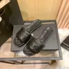 30% OFF Sapatos de grife grade uma linha chinelos mulheres verão cabeça redonda bordada linha sandálias confortáveis de fundo plano para uso externo