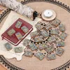 Pochettes à bijoux 25pcs pierres de puces naturelles tombées ensemble de pierres de rune gravée alphabet ancien Futhark résine de guérison cristal Wicca nordique