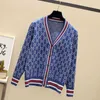 Projektantka Woman Sweter Odwrotny bawełniany Jacquard Cardigan Mens Polo Cardigans V Szyja Długie rękawowe kraje na dzianinowe płaszcz jesień zima Keep Walm Bottom P-P0202