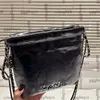 Gradient féminin Black Calfskin Coin 22 Mini Shopping Sacs Shopping Sacs avec pièce Lucky Charm Round Sobre en cuir Sac à main