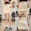 Анти-джинсовая короткая юбка, универсальная для женщин летом, с завышенной талией и запахом, студенческая корейская версия 240323