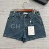 Chanei 24 Spring/Summer New Laser Burnt Flower Letter Blue Retro Old High midje denimshorts för kvinnor 970