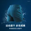 Erkek Şort Yaz Sporları Pantolon Koşan Üç Çeyrek ve Kadın Fermuar Cepleri Severler Açık Hava Günlük