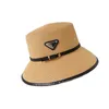 Solid Color Straw Hat P designer hattar för män fashionabla enkelhet svart vit blå cappello sommar utomhus fiske växt väv strand hatt ihålig ut pj088 c23