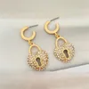 Boucles d'oreilles pendantes pour femmes, Design Unique, cerceau de verrouillage de couleur or, petites épingles de sécurité, bijoux minimaux