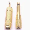 Nuevo cuadro de oro de 6.5 a 3.5 Adaptador de una sola vía femenina Máquina de orejas de micrófono de 3.5 mm a 6.35 Masculino