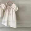 Koreanische Version des neuen Sommer-Mädchen-Baby-Bogen-Blasen-Schlaf-süßen Spitzen-Kleides mit quadratischem Ausschnitt 240402