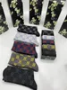 Nouveau style designer chaussettes hommes femmes serviette bas lettre broderie élite chaussette antidérapante chaussettes de sport résistantes à l'usure quatre saisons