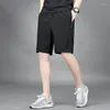 Short masculin à la mode lâche imprimé été décontracté rapidement sec respirant de taille élastique pantalon vêtements masculins