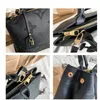 Sac de luxe Luxe Designer Merktas voor Dames Casual PU lederen handtassen Gegraveerd logo Lock Schoudertassen Veelzijdige draagbare Cross Body boodschappentas