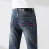 2024 New Spring/Autumn Mens Slim Fit 청바지 남성 스트레이트 패치 비즈니스 유명한 클래식 캐주얼 바지 Fashiom 브랜드 디자이너 청바지 SL888