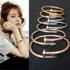 2024 Bracelet élastique à ongles fins pour hommes et femmes Han Chao Classique GD Même style Titane Acier Plaqué Or Rose Couple Bijoux