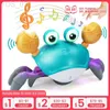 Zwierzęta elektryczne/RC Cling Crab Toy Touch i Walk Music Light Toys for Kids Toddler Interactive Learning Development YQ240402