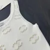 女性用Tシャツデザイナー女性夏のニットTシャツトップパールインレイドコットンクロップトップTシャツ服ハイエンドセクシープルオーバーベスト