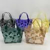 Sacs de plage Handheld New Crystal Lingge Contrast Transparent Panier Jelly Womens Bage Sac imperméable 2024 Cabbage Spring / Summer Splicing