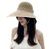 Sunscreen hat for women in summer Korean version with hollow bow and large brim, breathable sun shading straw hat, fashionable hollow top sun hat