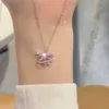 ピンクのダイヤモンドラブプラネットネックレス