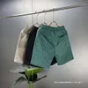 Sommer Neue Männer -Eis Silk -Shorts Strandhosen High -End -Licht Luxus gedruckt trendy vielseitig pi shuai schnell getrockneter Capris