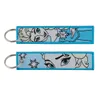 Porte-clés Longes Différents types de dessins animés Cool Key Tag Broderie Fobs pour motos voitures sac à dos porte-clés anneau de mode Gi Otitd