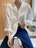 Blouses Femmes 90% coton blanc travail femme chemise 2024 printemps bureau dame tops minimaliste à manches longues col en V boutonné femme poche lâche