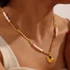 Pendentif Colliers Rétro Collier en acier inoxydable Fleur Plante avec collier de perles Chaîne Lumière Os de luxe