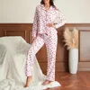 Vêtements à la maison Femmes Pyjama printanier Print coeur Impression de bouton à manches longues Clôture de bouton avec pantalon Loose Sleepwear Loungewear