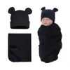 Couvertures née en mousseline enveloppe avec un chapeau bébé recevant une couverture de couverture de couchage solide