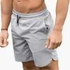 Pantaloncini da uomo Europa America Palestra Pantaloncini fitness estivi Pantaloni da corsa casual a cinque punti Allenamento da basket da uomo Veloce e asciutto NuovoC240402