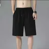 Erkeklerin hızlı kurutma nefes alabilen yaz yeni gevşek spor plajı 5/4 orta pantolon, büyük şort, erkek