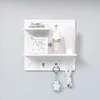 Nieuwe 2024 Room Decor Decor Hole Board Wall Shelf Hooks Desk Organisator Make -up organisatoren Room opslagrek Huisaccessoires Punch -vrije gaten - voor