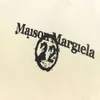 Camiseta de designer Maison Margela Camisetas Mm6 Calendário do início da primavera T-shirt das mulheres dos homens Top de manga curta O calendário inteiro está impresso nas suas costas 157 592 279
