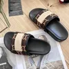 Sandaler Designer tofflor Högutgåva G Summer Mens Ladies Couples Wear Resistenta Word Beach Slippers With Printed Letter Bread Slippers Storlek 35-44