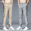 Primavera verano pantalones casuales hombres delgado estiramiento slim fit cintura elástica negocios clásico pantalones coreanos masculino caqui gris 38 240319