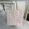 Designerbeutel für Frauen Freigabe Verkauf Damen Japanische Original geometrische Fabrik 2024 lebenslange neue modische Zhenjin -Umhängetasche Diamant Sechs Grid Tote Handtasche
