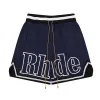 Shorts designer Rhude Mens Mesh Short Summer Fashion Beach Band Pants Elastic Bande Uomini di alta qualità usura di pantaloni viola neri blu rosso v7xt