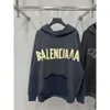 Mäns designer hoodie balencigs mode hoodies hoody mens tröjor hög kvalitet 23ss b hem hög kvalitet gul tejp tryckt os lös passform slitna wgm8zmwp hyrl hyrl