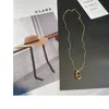 Collana con ciondolo al naso di maiale lungo in rame di lusso, collana con naso di maiale con clavicola CD, versione minimalista con catena maglione piccola profumata con logo