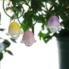装飾的な花の花のピックスタンド屋外の偽の庭の装飾家のキッチンベッドルームフェスティバルウェディングのためのフェード樹脂植物のフェイクなし