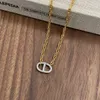 Luxe koperen ketting met lange varkensneusbedel.925 sterling zilveren varkensneusketting met diamanten gesp en universele gesp met logo