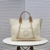 Strandpåsar lyxiga tygväska handväska designer axelväska kvinnor shopping handväska deauville cc pärla canvas crossbody plånbok beige rese pochette korthållare 39 cm