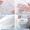 50pcs Couvre-toilet de toilette en plastique jetable