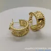 Boucles d'oreilles de créateur de marque High End d'origine 1 à 1 boucles d'oreilles en forme de femme Diamond à quatre boucles d'oreilles d'herbe avec un petit kaléidoscope à petit design