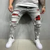 Męskie dżinsy mężczyźni szczupły rozryte męskie malowane moda Patch żebrakowe spodnie jumbo ołówek hip hop kropla dostawa odzież dhagc